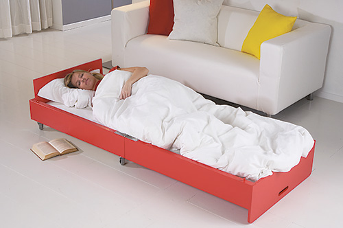 Sleeping in a converted coffee table bed