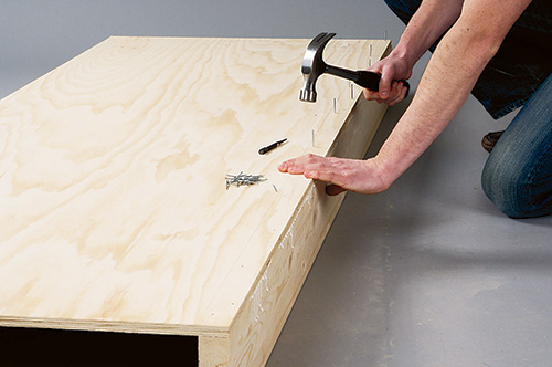Attaching rails to convertible coffee table bed base