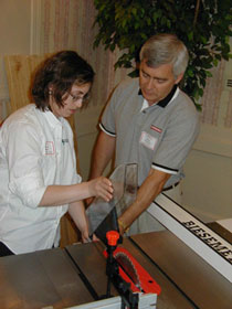 A single-knob release on the blade guard of Craftsman's Professional 10" table saw makes it easy to remove or replace the guard, depending on cutting application.