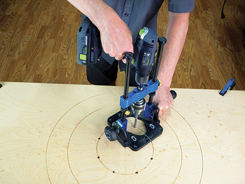 Using drill guide to cut even holes for peg holes