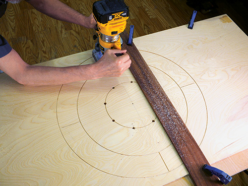 Using board to guid outer router cuts for gameboard