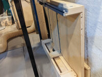 Crosscut sled under table storage