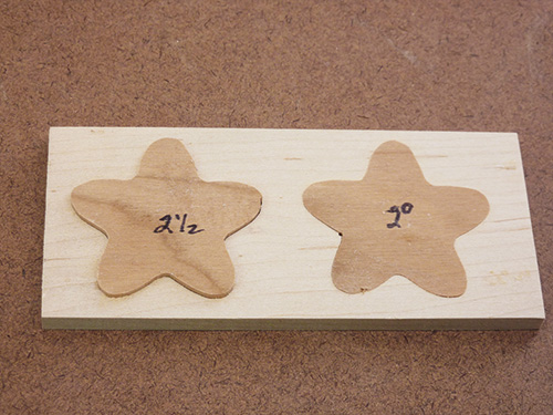 Marked test inlays for reproduction at a scroll saw