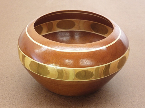 Bowl with scroll sawn center ring