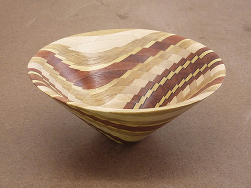 Patterned bowl created by scroll sawing and glue up