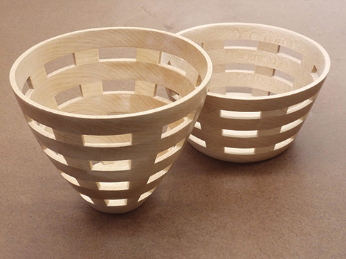 Two bowls made by a scroll saw cutting at different angles