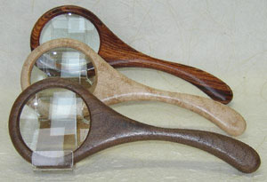 Davin and Kesler's Magnifying glasses come in cocobolo, cherry, maple, padouk, hawaiian koa and walnut.