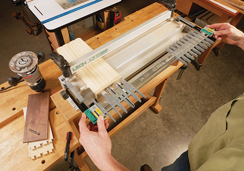 Changing adjustable dovetail template for routing pins