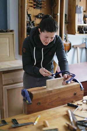 Cutting dovetails for whiskey cabinet with fret saw