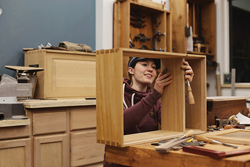 Making adjustments to whiskey cabinet dovetails