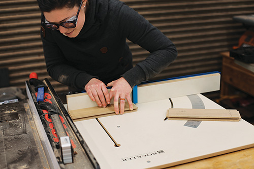 Cutting door tenons with crosscut sled on table saw for dovetailed whiskey cabinet