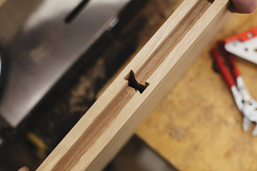 Aligning two sides of Dovetailed whiskey cabinet 