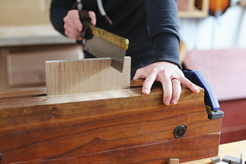 Hand cutting whiskey cabinet dovetails with a backsaw