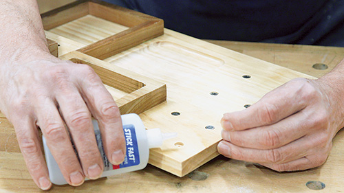 Gluing magnets in to drill bit storage holes