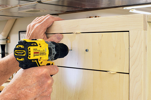 Cutting holes for drawer pull installation