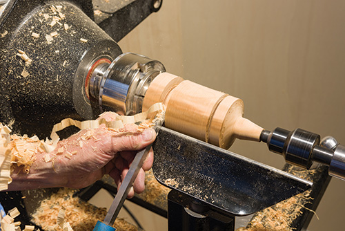 Cutting earring stand post with a parting tool