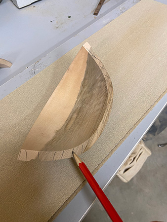 Marking edges on bowl half blank before smoothing