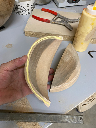 Spreading glue on edges of elliptical bowl blanks