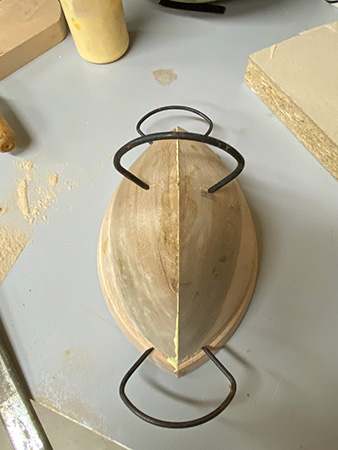 Clamping together two sides of bowl blank