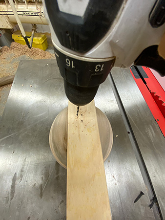 Attaching scrap straightedge to bowl blank