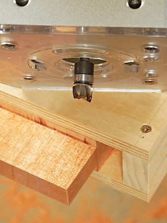 Close-up of slightly modified piloted mortising bit and routing jig