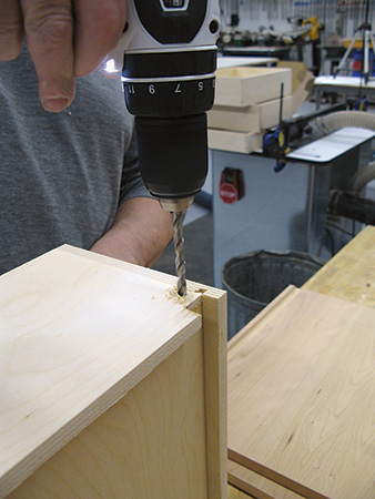 Drilling hole for drawer hook installation