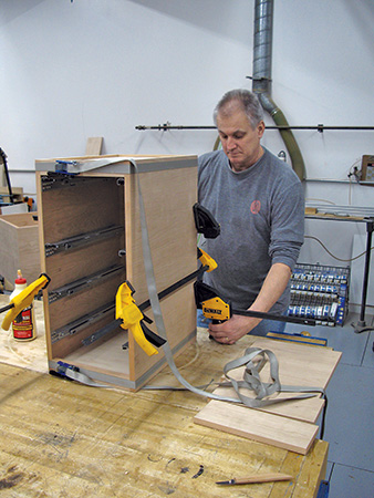 Clamping drawer and slide installation for entry bench