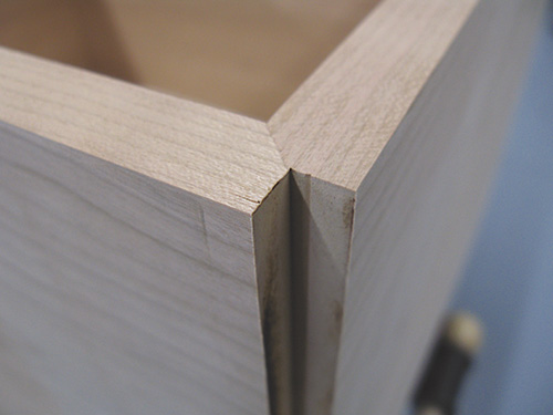 Close up of entry bench drawer cabinet corner joinery