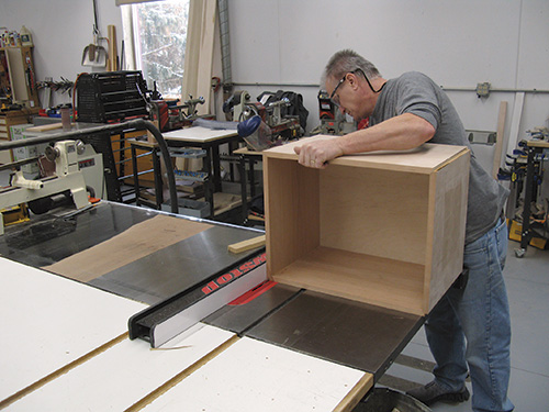 Cutting corner notch in entry bench drawer casework