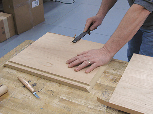 Filing edges off of veneer tape