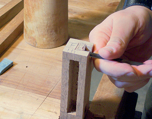 Chiseling dovetail in envelope table stretcher