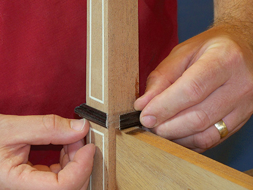 Installing maple moldings on envelope table legs