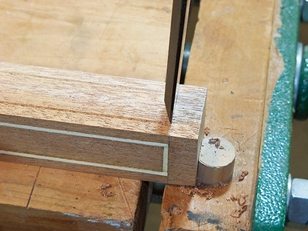 Cutting groove in envelope table with bench chisel