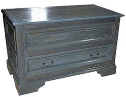 This style of chest has a long tradition in Quebec City where it once held a bride's trousseau.