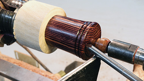 Cutting short tenon in spinning top base wasteblock