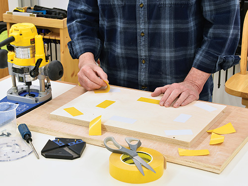 Attaching circle cutting jig to workpiece with double sided tape