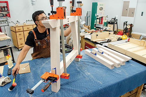 Gluing and clamping dining table leg assembly