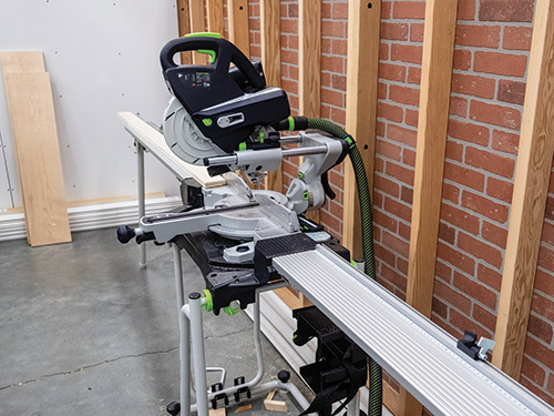 Festool cordless sliding miter saw on a stand