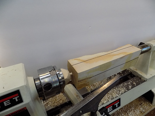 Mounting wood for lamp spindle in lathe