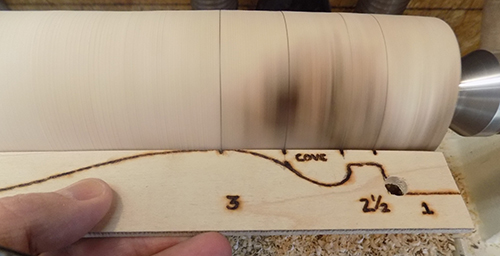 Marked layout guide for turning lamp spindle