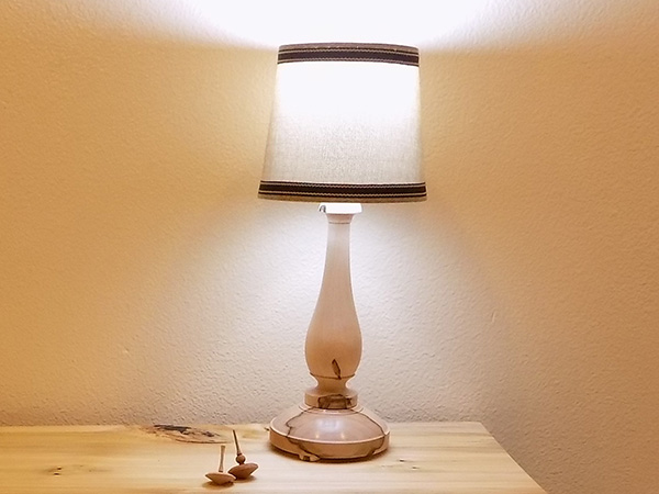 Turned firewood table lamp