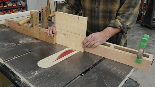 After cutting the 8° angles at the top and bottom of each leg, make the shoulder cuts for the stretcher notches. These also are angled at 8° to match the top and bottom edges of the legs.