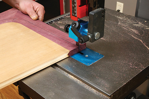 Removing excess shelving trim with band saw