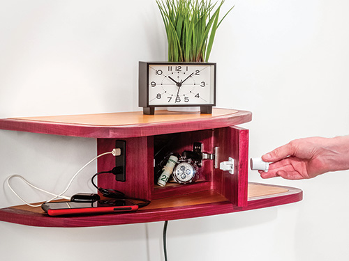 Wall shelf with locking mechanism and charging cables