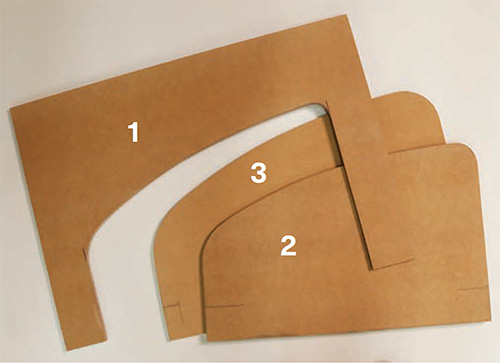 Three templates cut out for laying out wall shelf parts