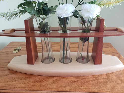 Holder for three flower vases