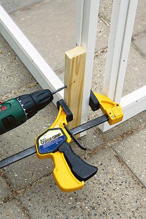 Shop-made clamping jig for fold-up greenhouse corner joinery