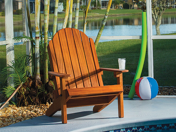 Folding adirondack chair at poolside