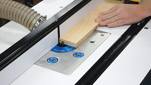 Cutting back panel grooves for folding shop desk