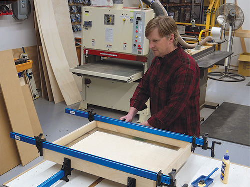 Clamping casework for folding shop desk project